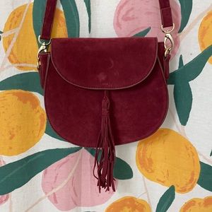 Red maroon suede Akaiv purse with tassel